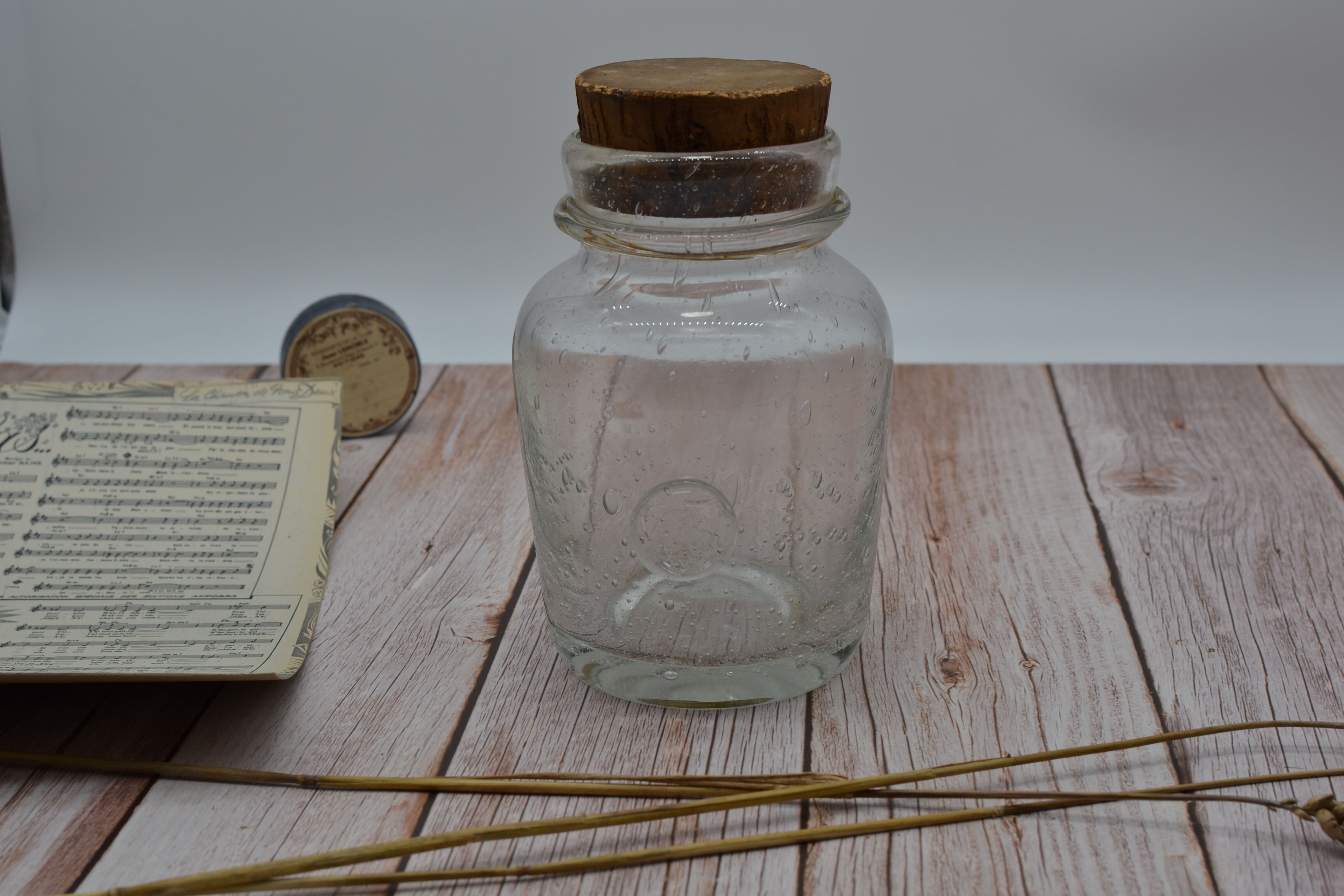 Blown glass jar with original cap