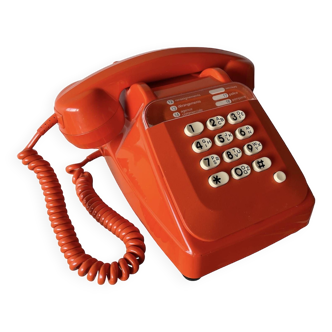 Orange Socotel telephone with buttons from the 80s
