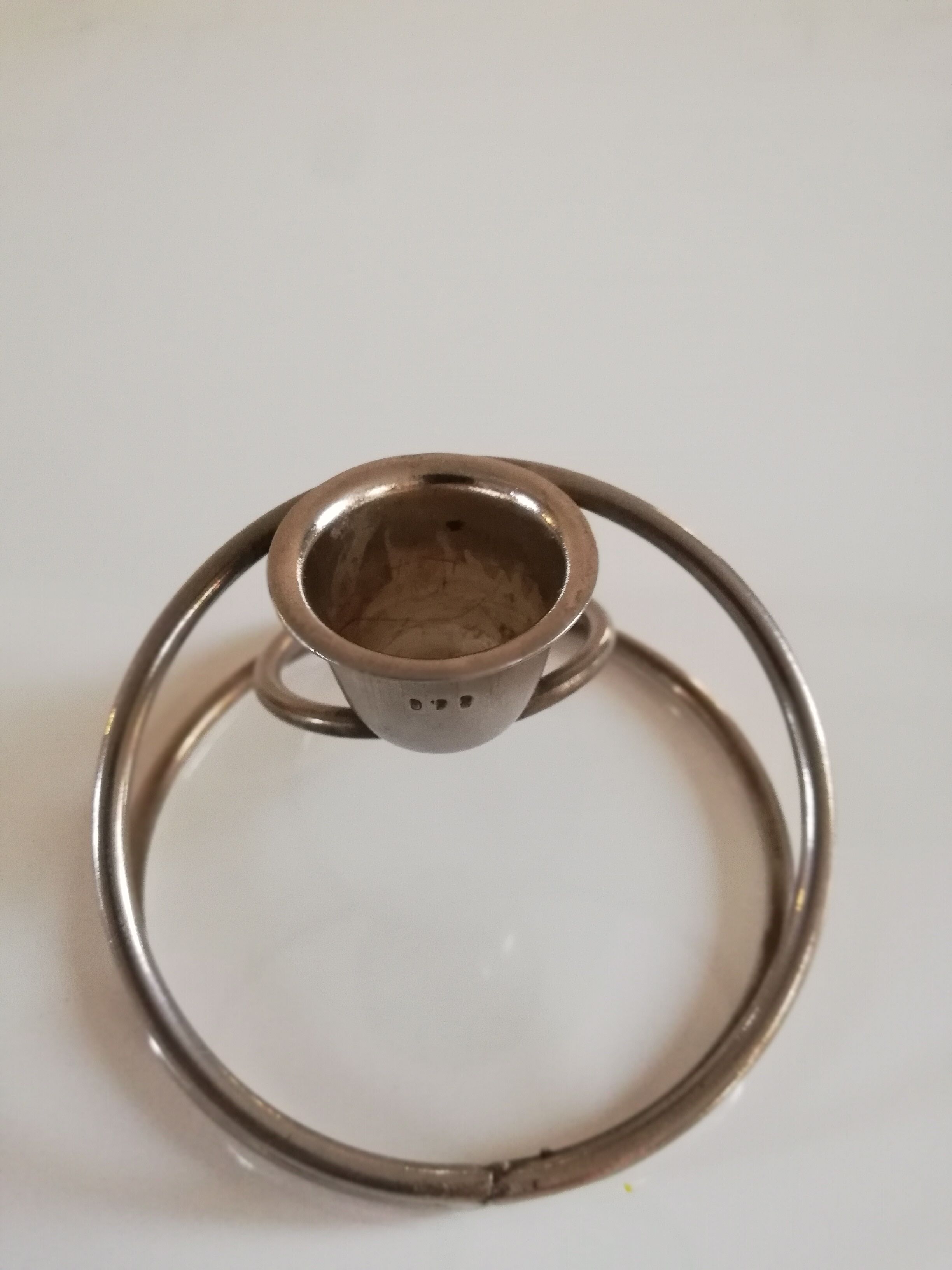 Pair of white metal candle holders