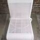 White woven resin garden chair