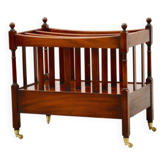 Support made of hardwood with a drawer and wheels.