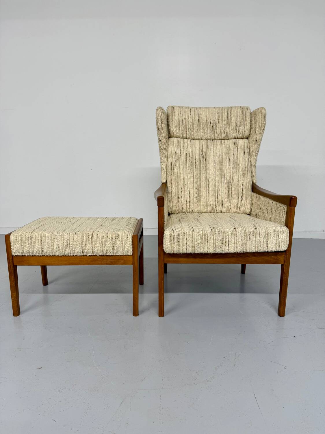 Vintage Casala wingback armchair with ottoman, 1970s design