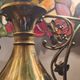 Antique bronze lamp and Tiffany-style stained glass shade. 46x32