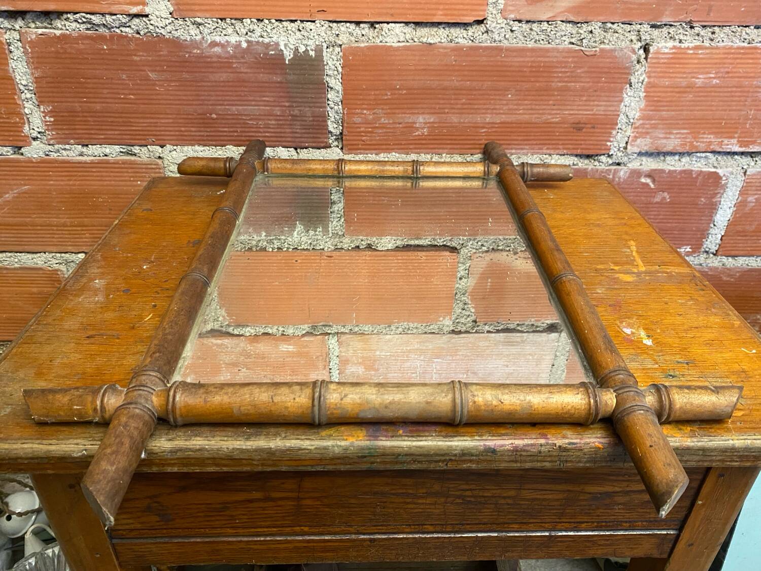 Antique mercury mirror with wooden frame and bamboo style vintage