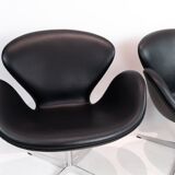 A pair of Swan chairs, model 3320, designed by Arne Jacobsen in 1958
