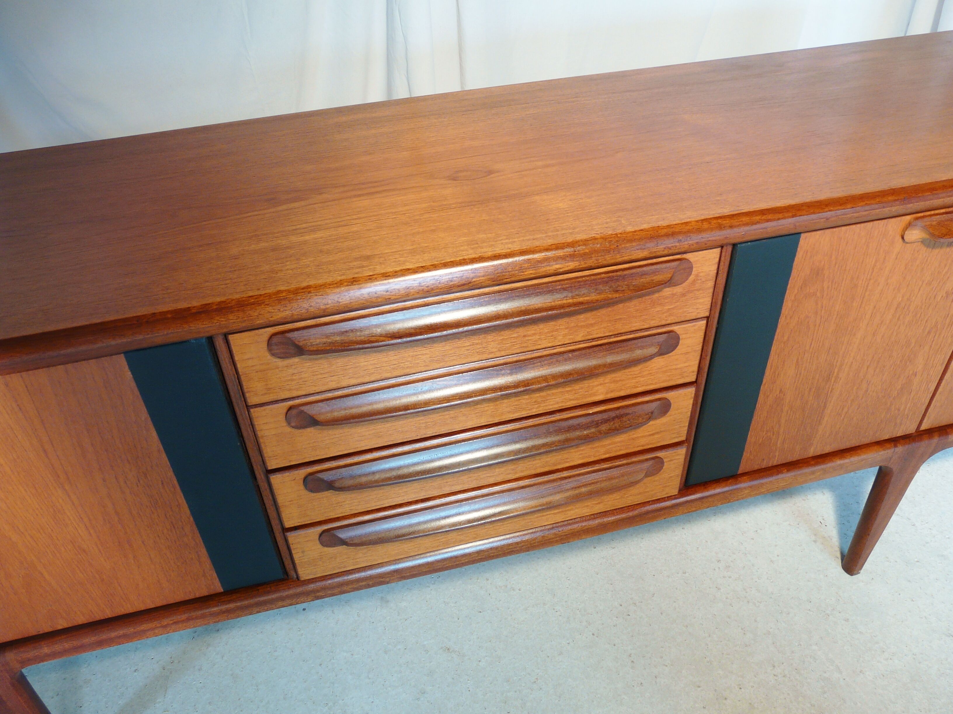 Younger Scandinavian teak strand