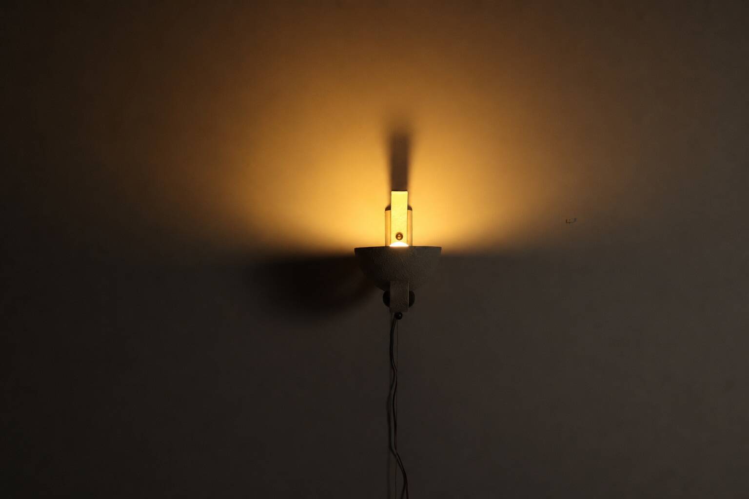 Pair of sculptural mid-century wall uplighters, circa 1950