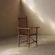 Brutalist armchair made of hazel branches, circa 1970.