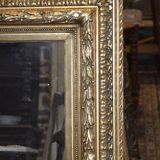 Moulded gold mirror