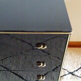 Lacquered black chest of drawers, golden brass