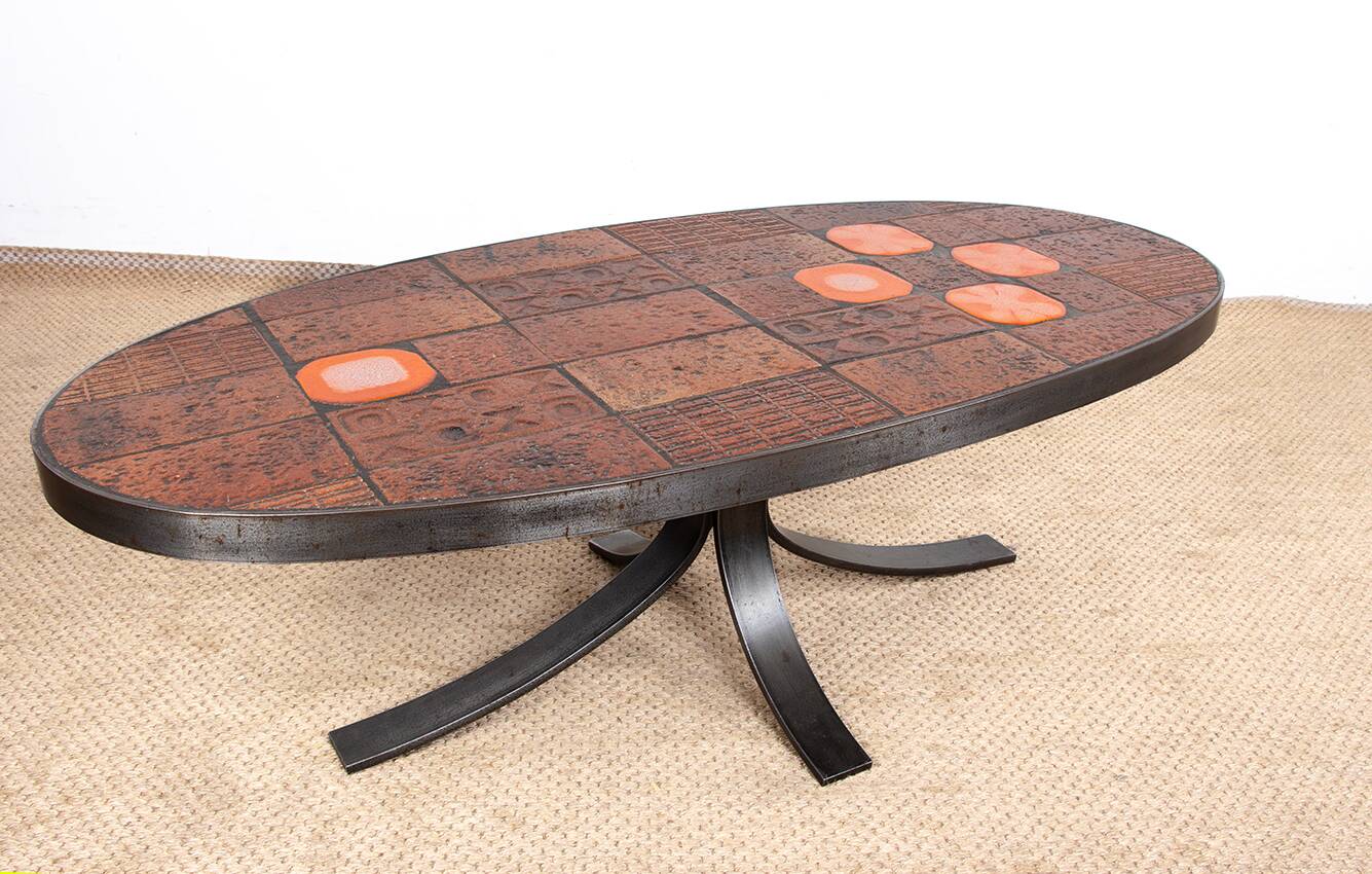 Coffee table in lava stone, ceramic and steel by Jean Jaffeux 1960.