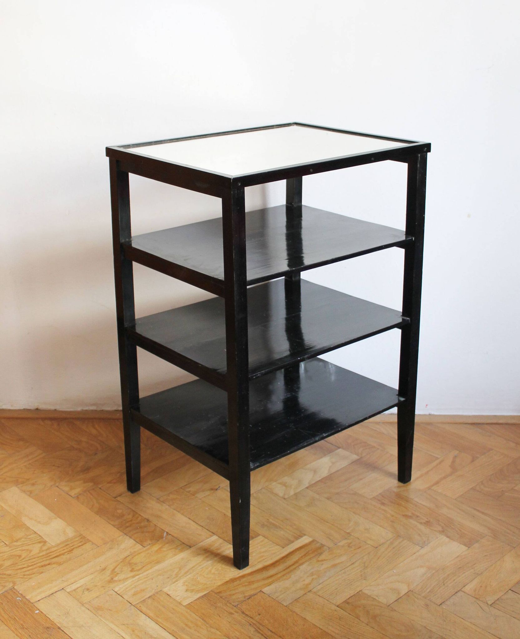 Late 1940s Czechoslovak Functionalist Étagère in Black Wood and Bevelled Gl