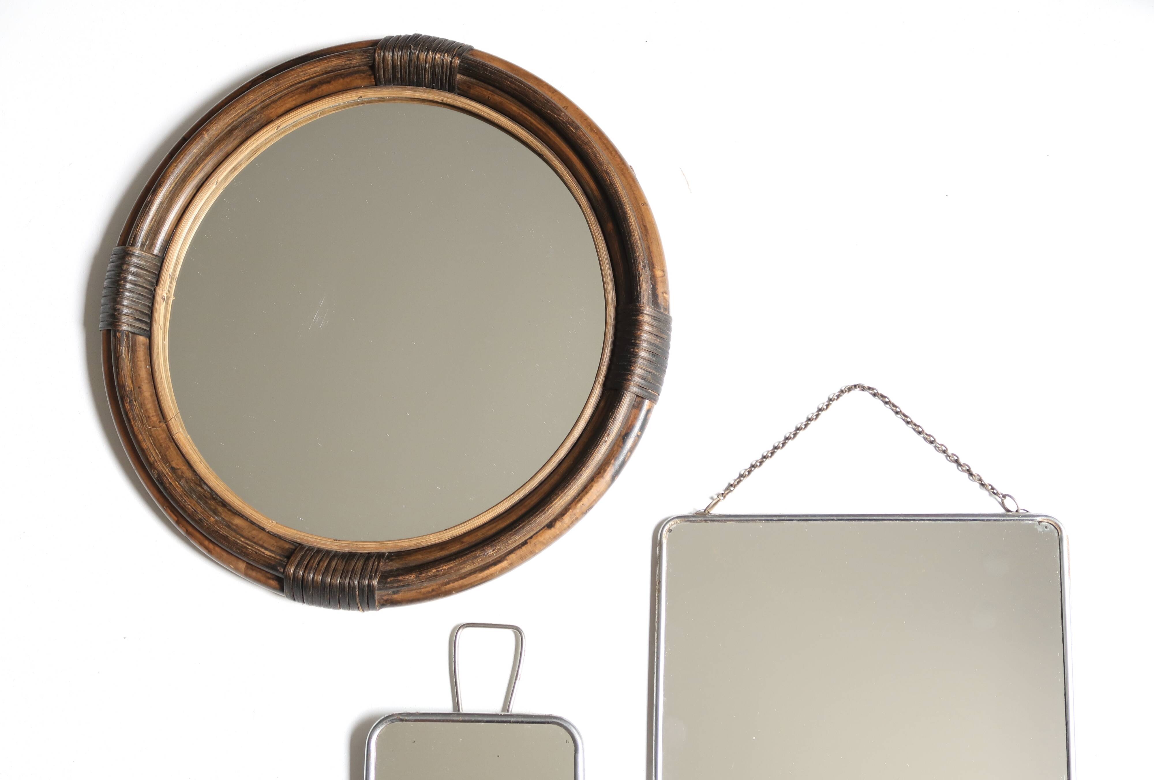Round mirror in dark rattan, 50s