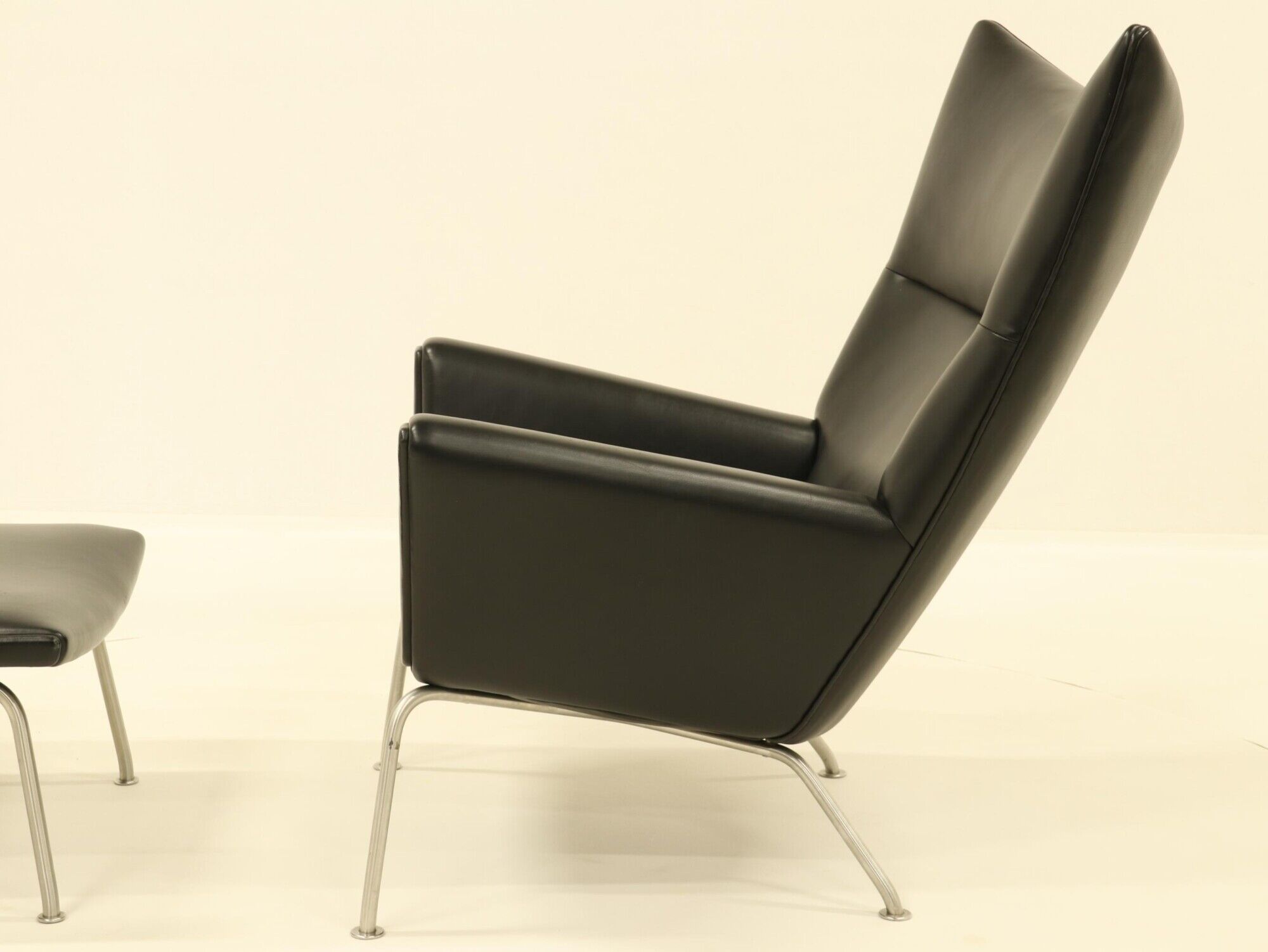 Wing chair & matching ottoman – CH445 & CH446 – by Hans Wegner