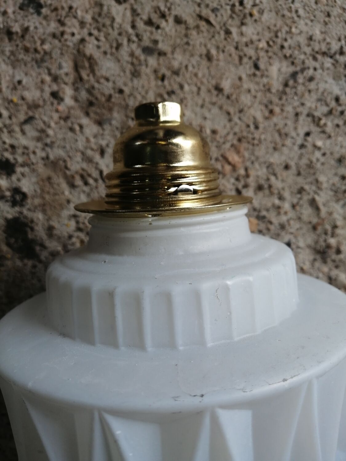 Vintage globe pendant light in molded glass.