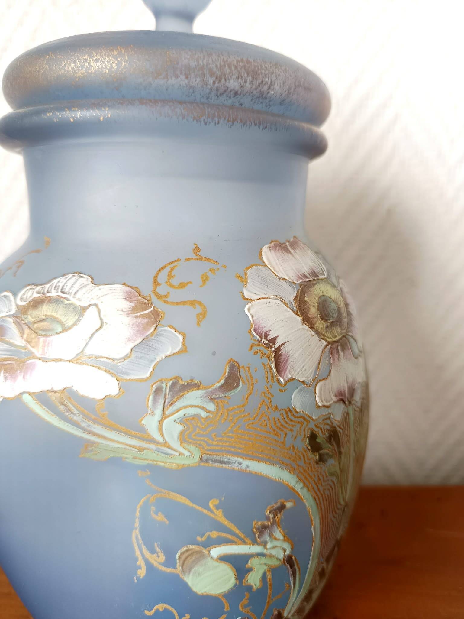 Art Nouveau covered vase with anemones