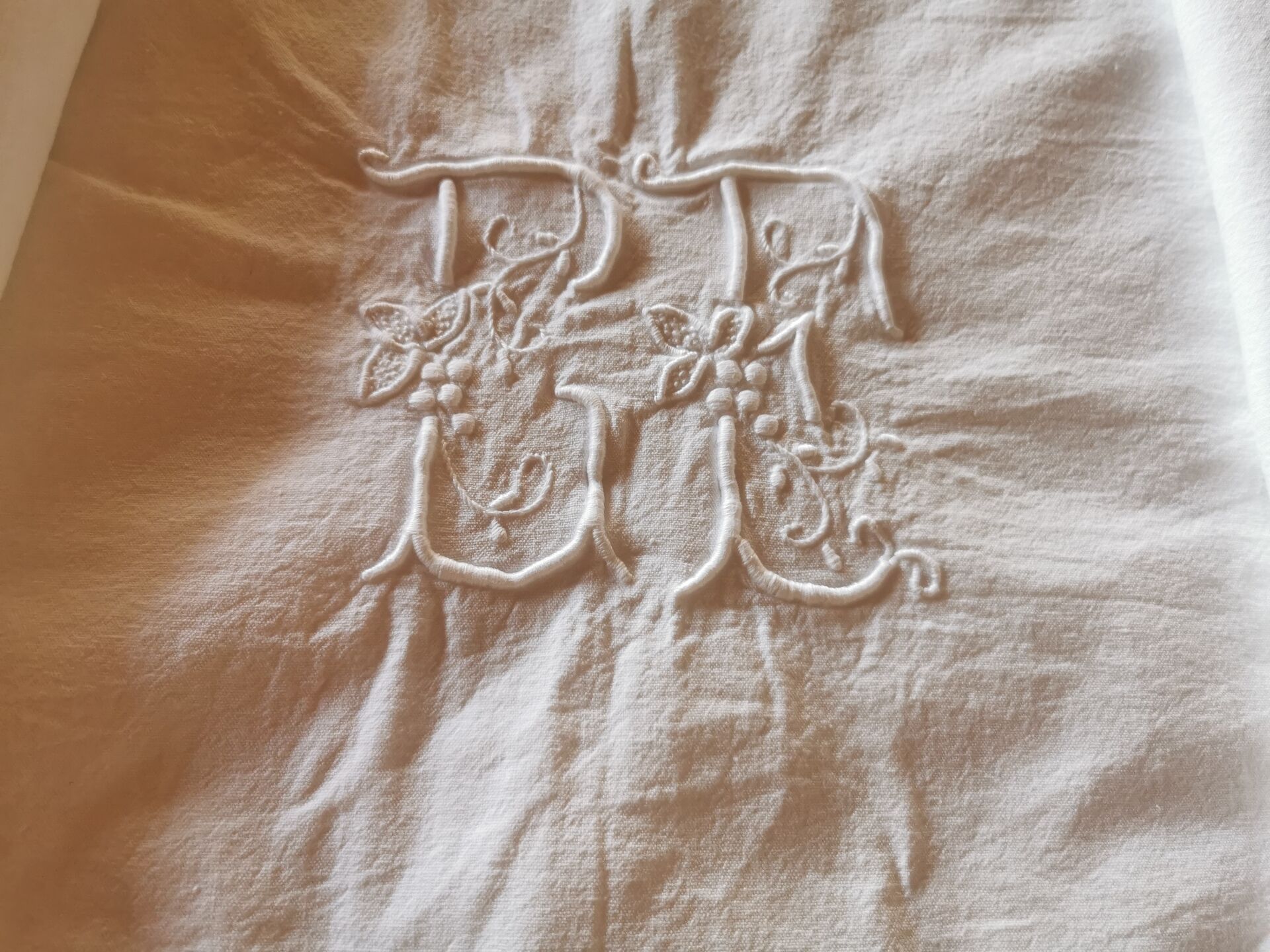 Antique monogrammed fabric