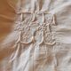 Antique monogrammed fabric