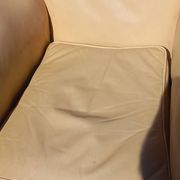 Pair of 1930s club armchairs in ivory leather.
