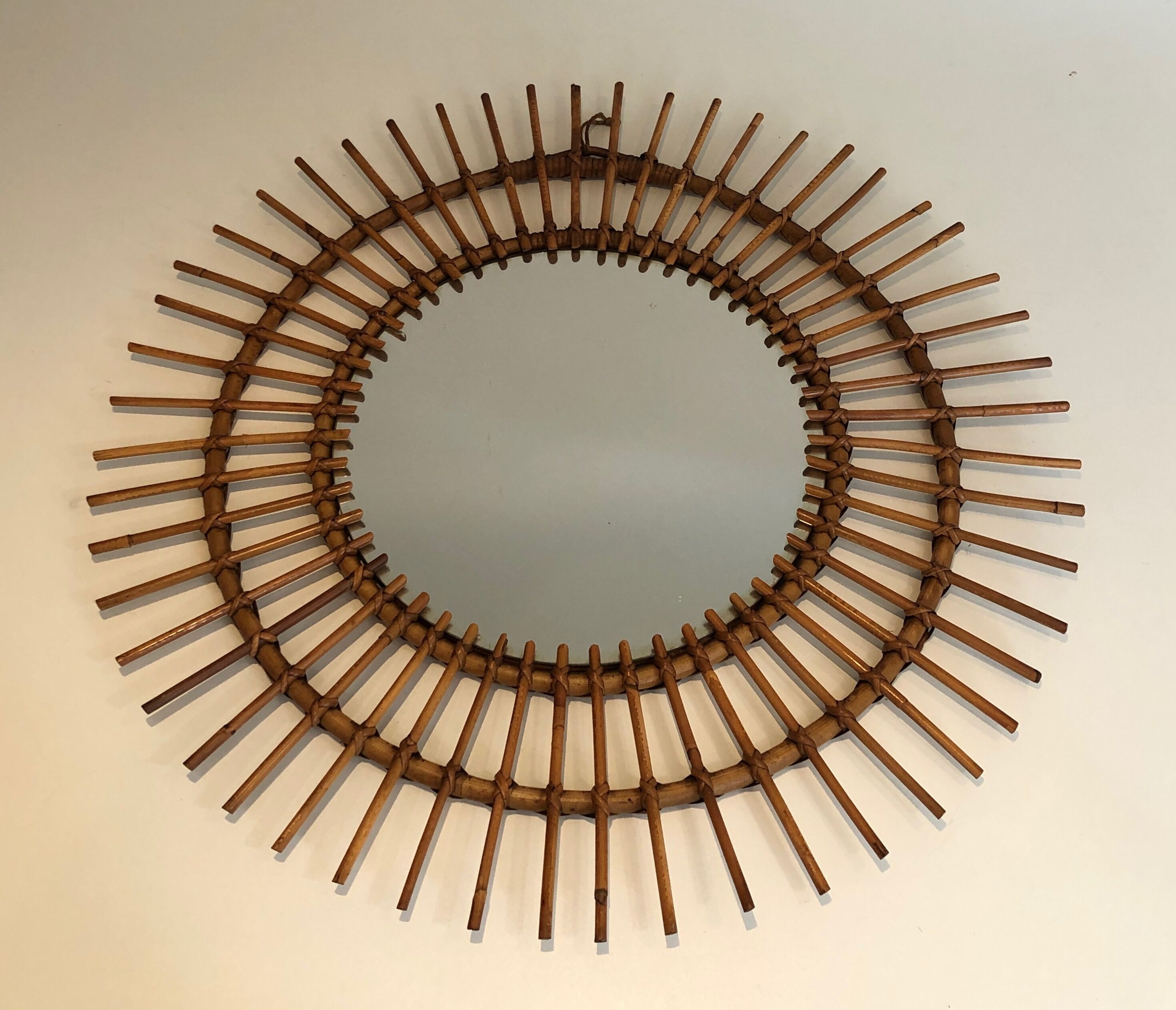 Small Rattan Mirror. French work. Around 1970