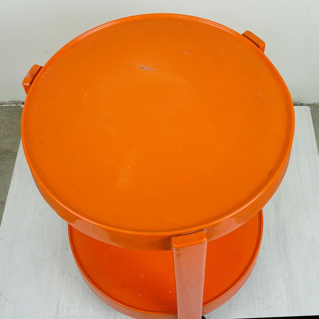 Circular orange Italian Space Age plastic trolley