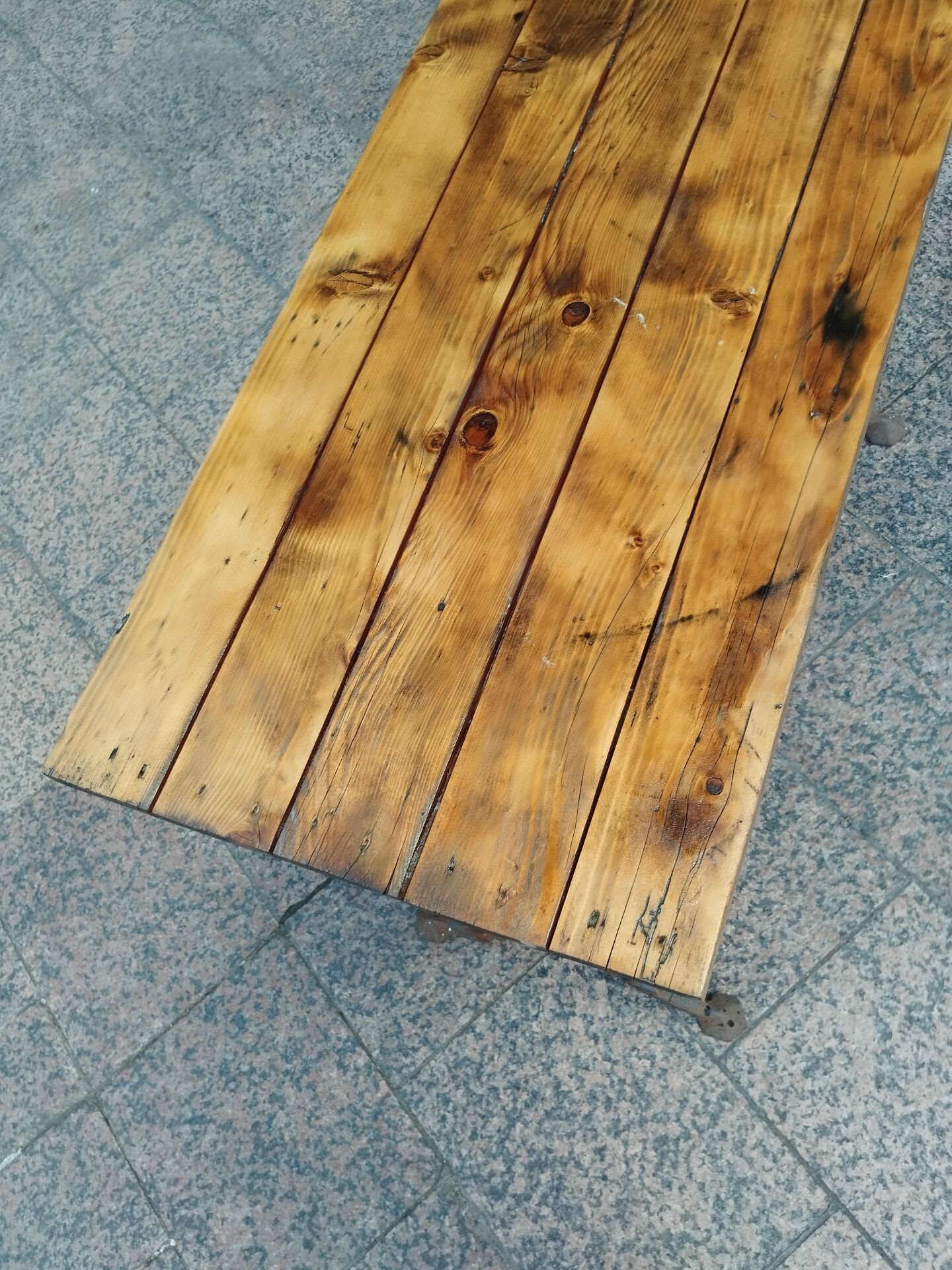 Old bistro table with a wooden top