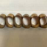 Six anciens ronds de serviettes en laiton