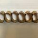 Six old brass napkin rings