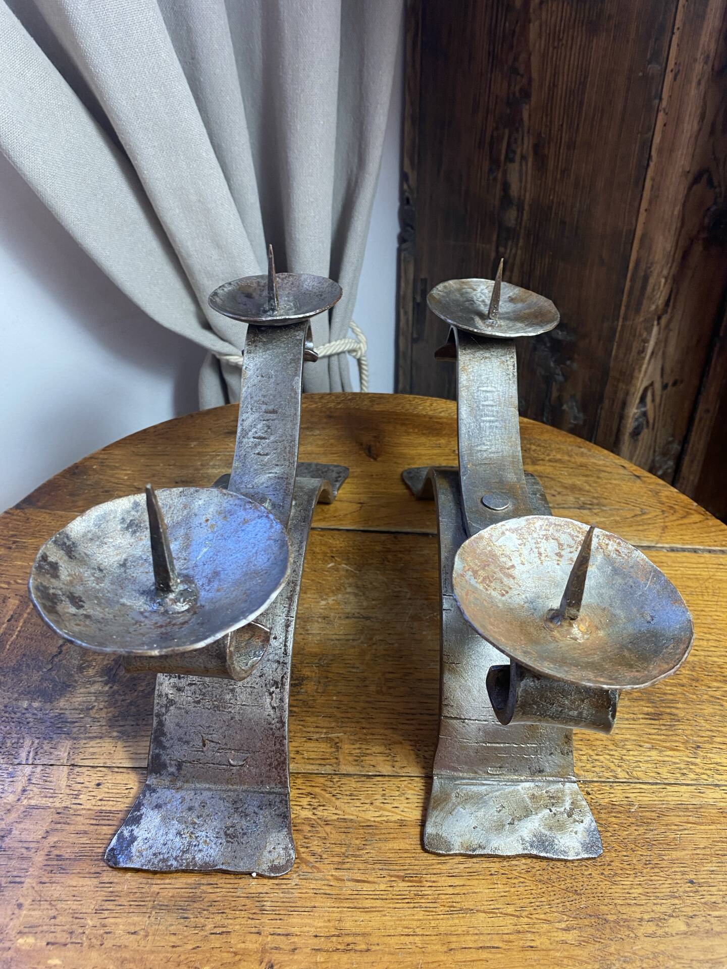 Brutalist wrought iron candlestick pair