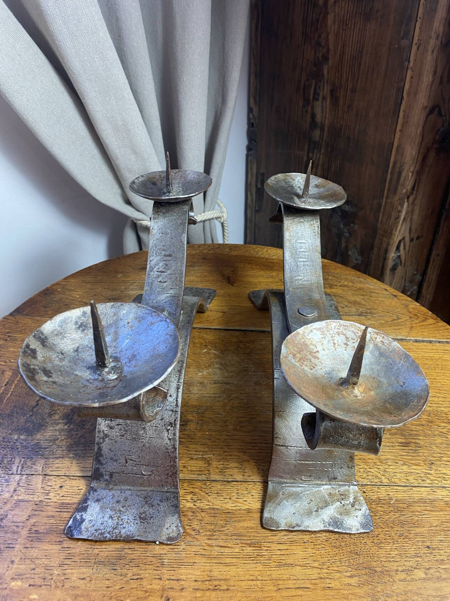 Brutalist wrought iron candlestick pair