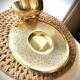 Cup and saucer in brass Saint Médard (18th century)