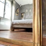 Antique gilded Louis XV pediment mirror