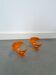 Set 2 x space age oranje haken, wandhaak, kapstok