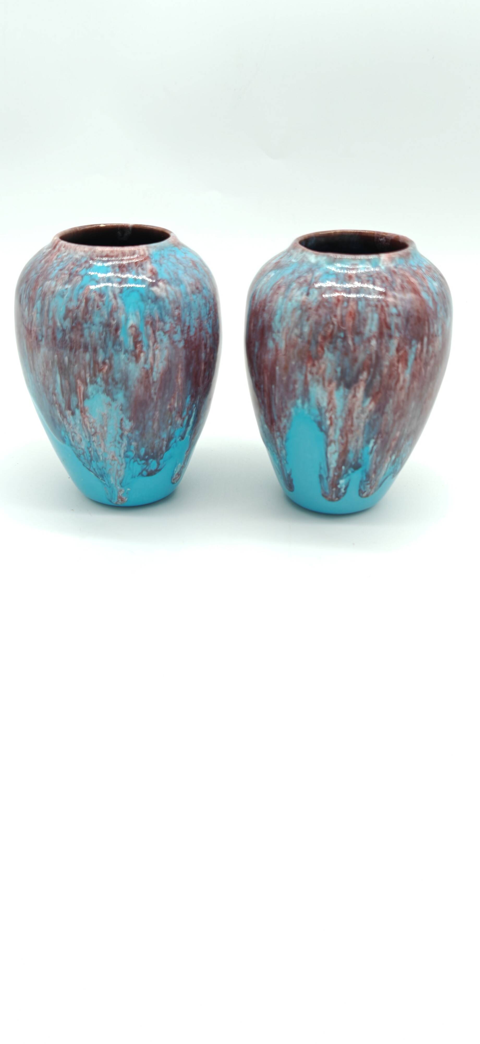 Pair of small turquoise blue vases in flamed stoneware with wine