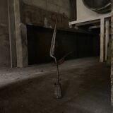 Signed hammered metal and copper sculpture