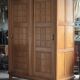 Vintage wooden wardrobe with sliding doors