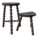 Two French farmhouse stools made of turned wood.