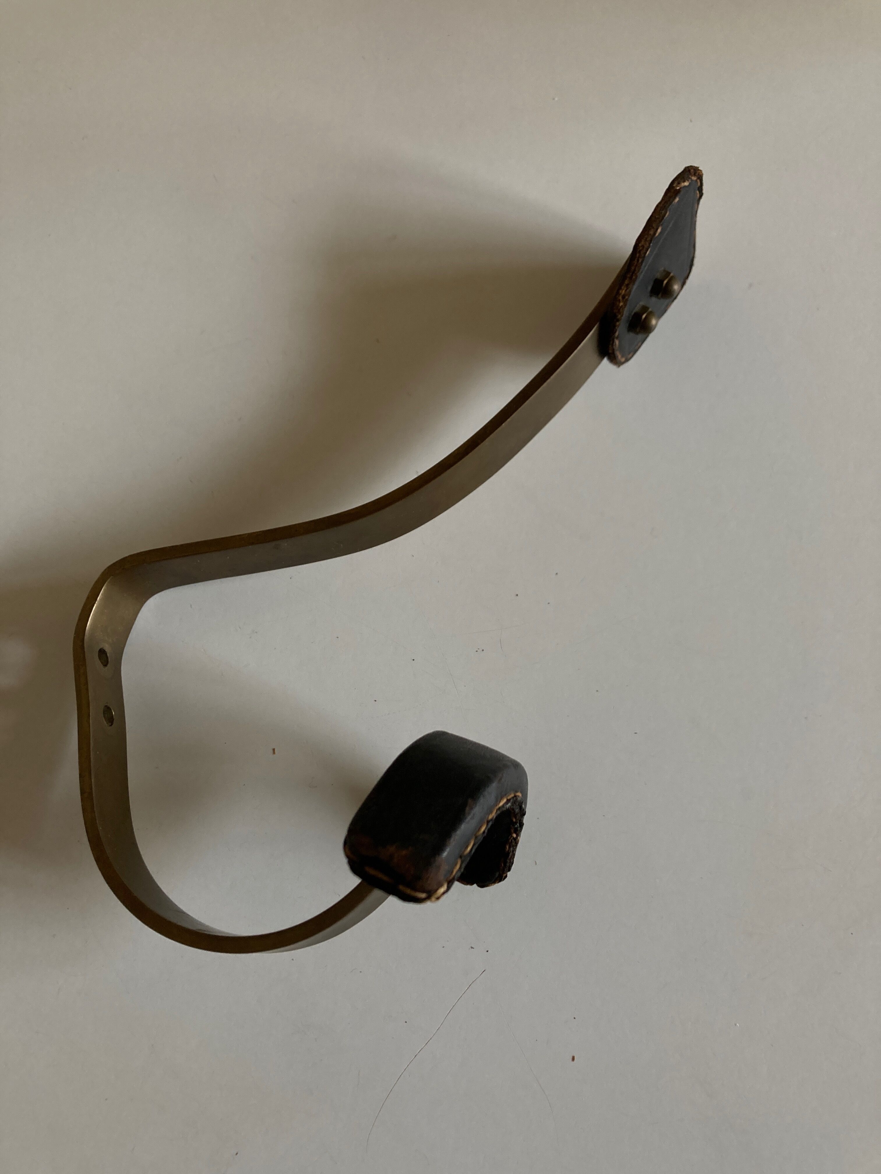 Adnet hook in bronze and leather 1950