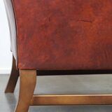 Large comfortable sheepleather wingchair in good condition and beautiful colours