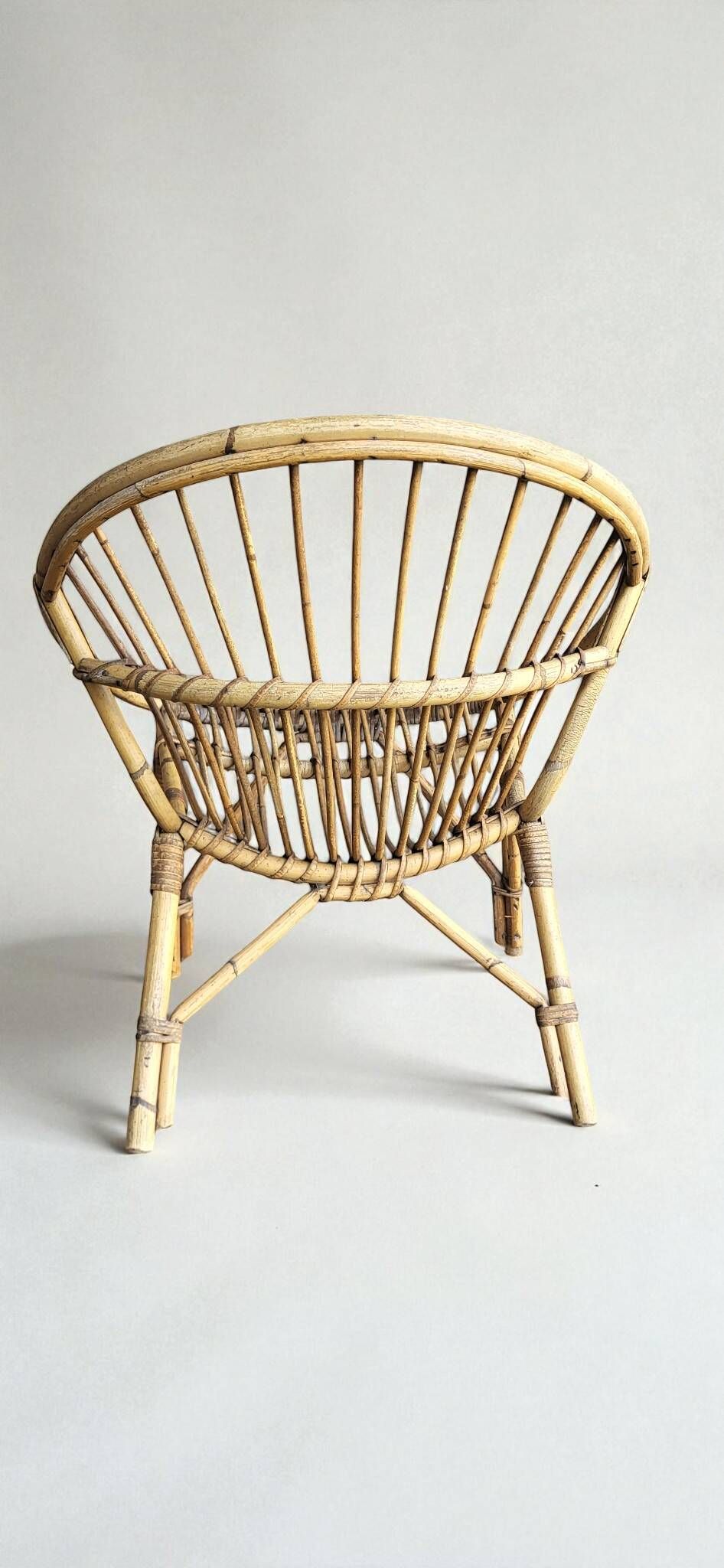 4 fauteuils "coquille" en rotin 1960's
