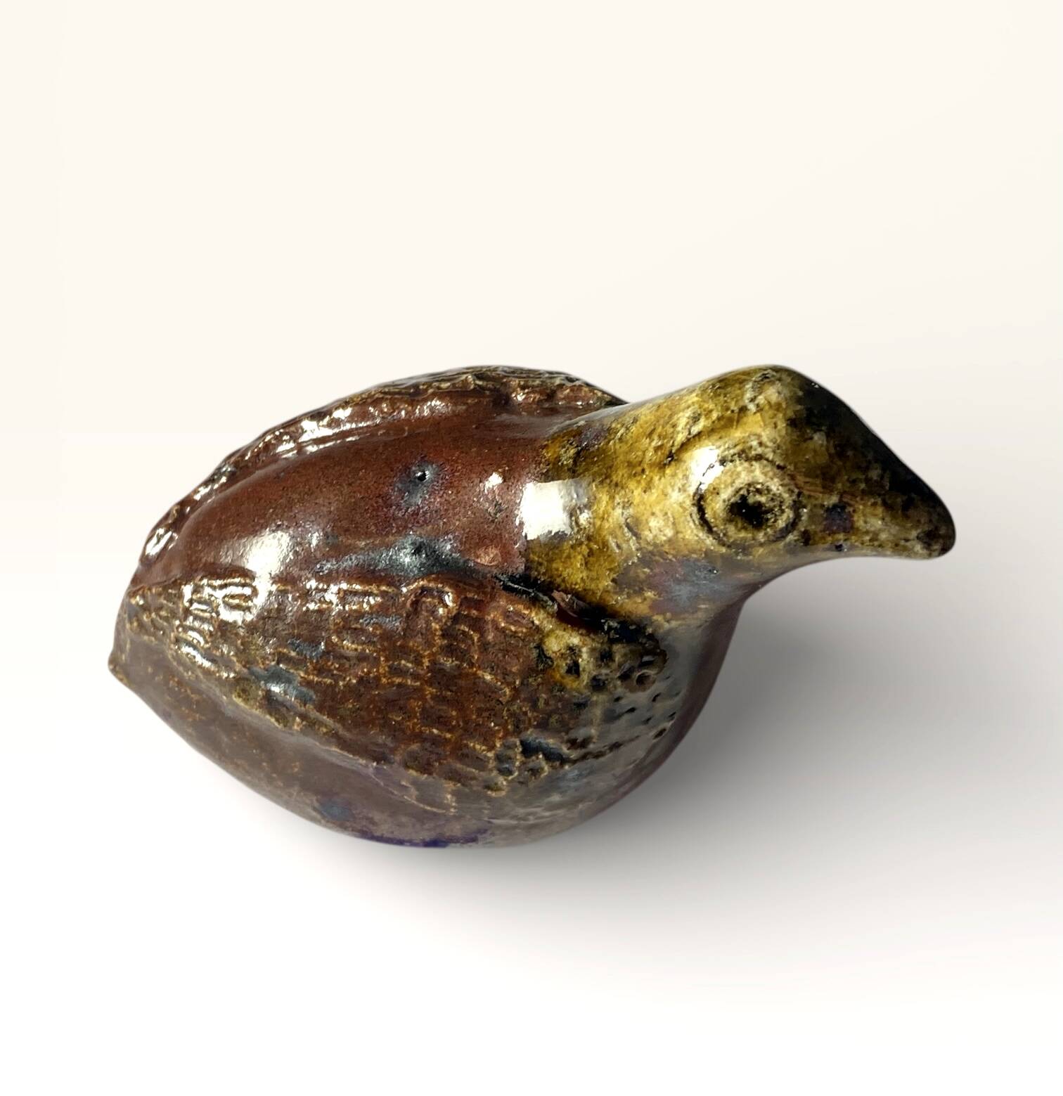 Ancient zoomorphic whistle of a partridge bird in glazed stoneware from La Borne.