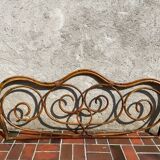 Vintage 2-person rattan headboard bed
