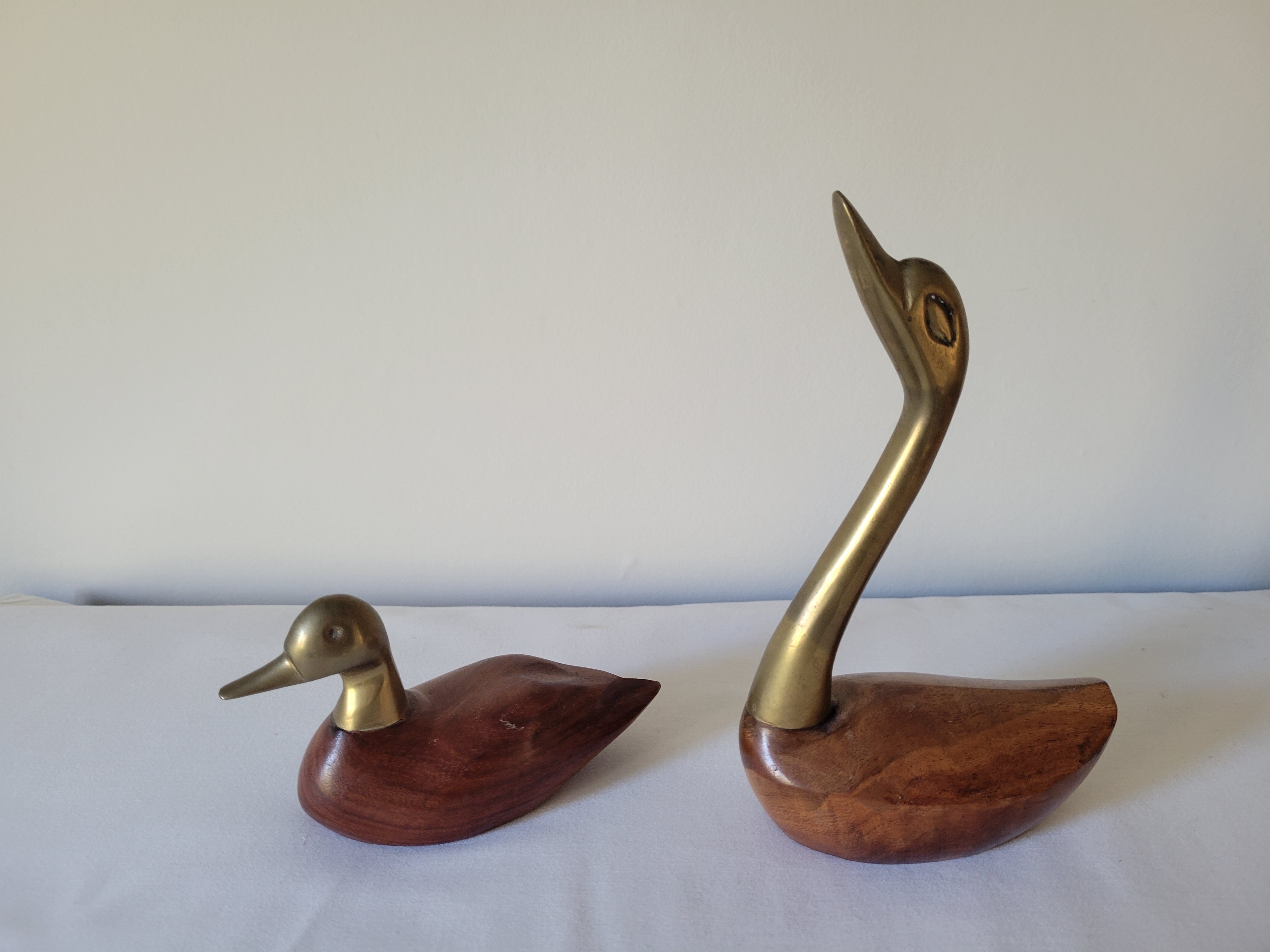 Duck and swan in brass and wood