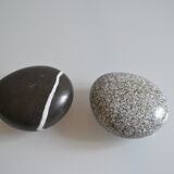 2 boxes in lithographed sheet metal in the shape of a pebble