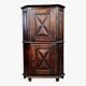 Rustic Louis XIII style corner cupboard in solid oak circa 1800