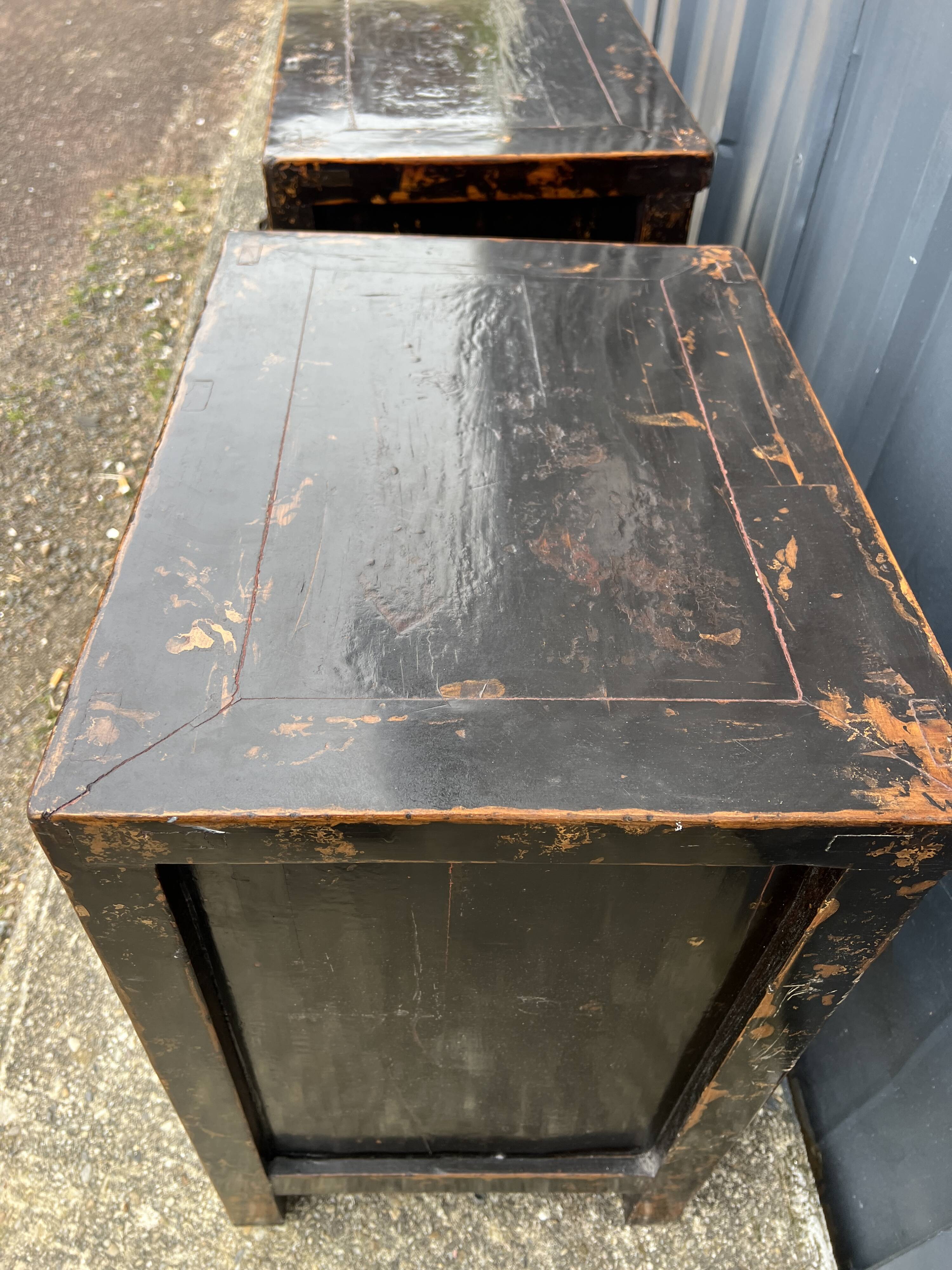 Pair of small occasional or sofa end pieces, lacquered in Asian black