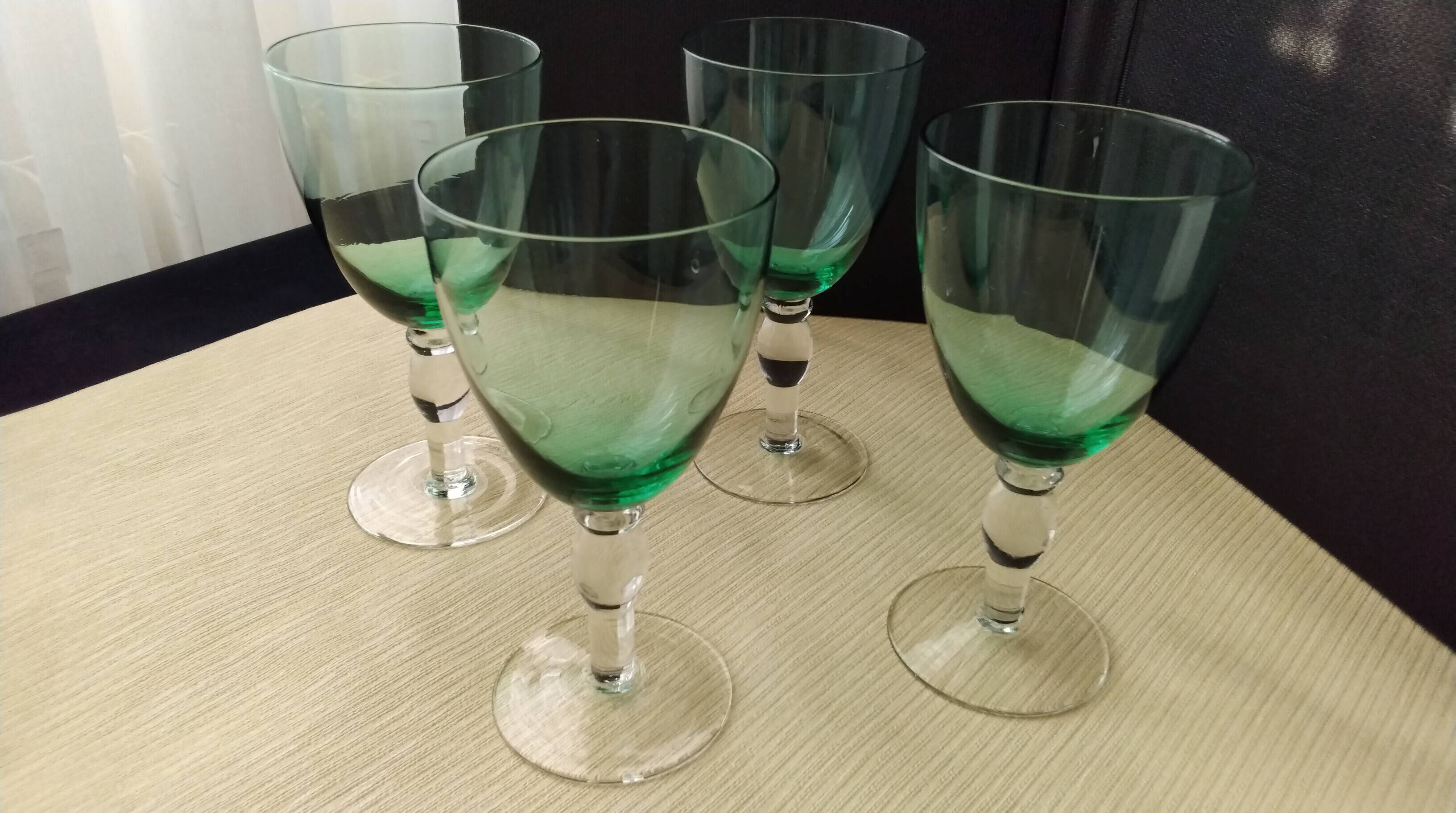 4 Water glasses or large wine glasses in green glass