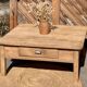 Large square farmhouse coffee table made of raw solid oak.