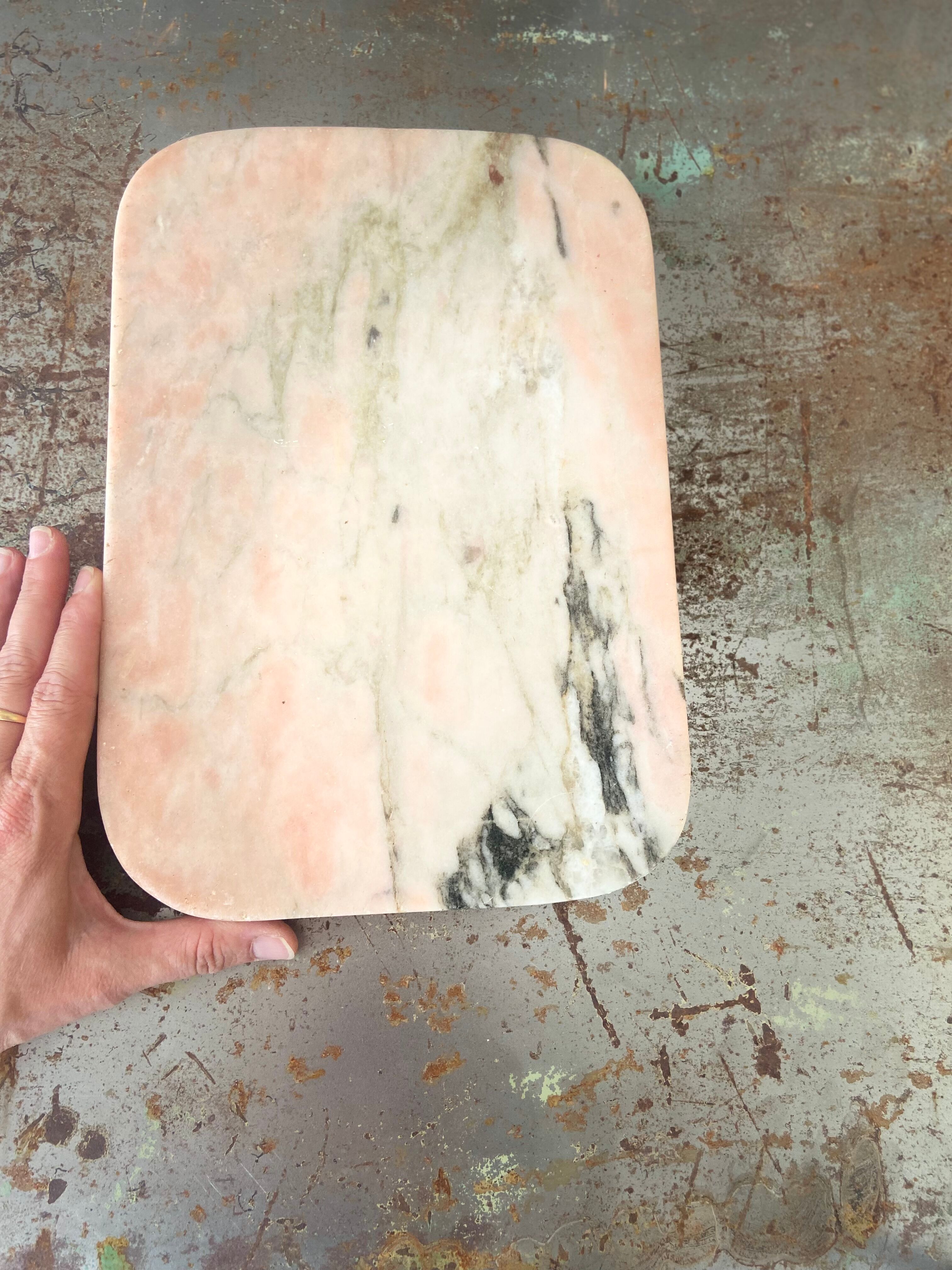 Cutting board in pink natural marble