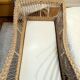Rattan and wrought iron cradle